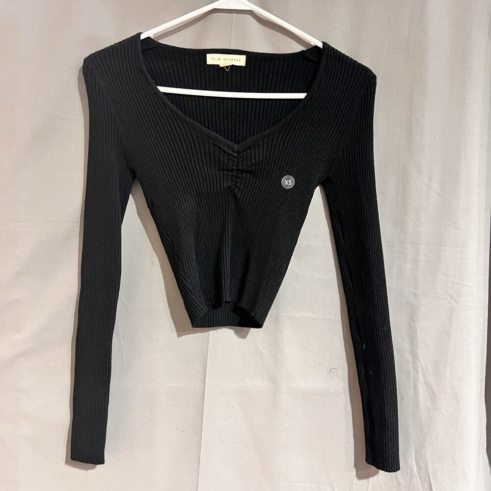 long-sleeve crop top is likely from the brand La Hearts Size Extra Small TG2063